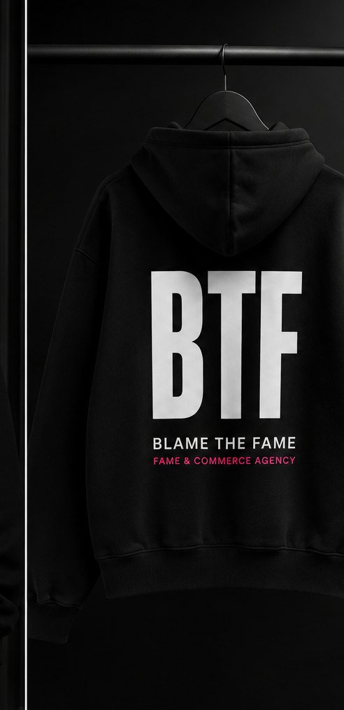 The BTF hoodie from the back, with a large white BTF wordmark above the words Blame The Fame
